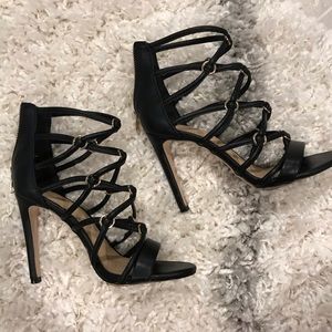 Black and gold strappy shoes